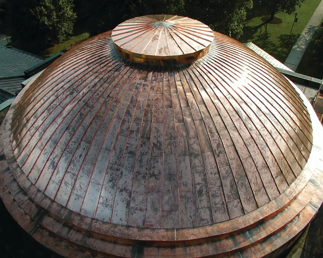 Craftsman Roofing crew installing a new roof in Downtown Colorado Springs